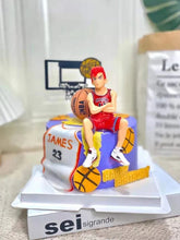 Basketball Player Sitting Figurine - Red Hair